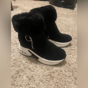 Black and white ankle boots. Size 9 but fits like an 8.5